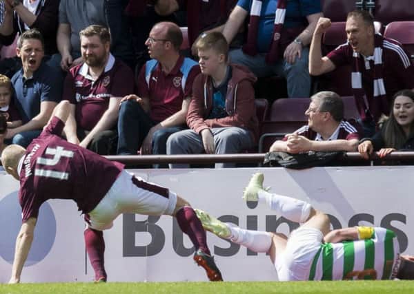 Steven Naismith has been punished for this tackle on Scott Brown. Pic: SNS