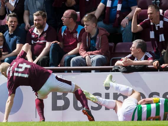 The SFA have punished Hearts' Steven Naismith for this tackle on Scott Brown.