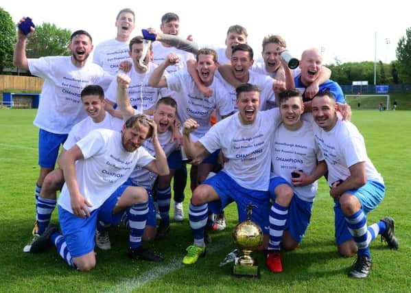 Musselburgh Athletic celebrate clinching the Premier League title. Pic: Jon Savage