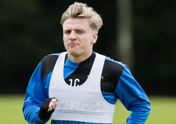Jason Cummings will line up against old club Hibs for Rangers on Sunday