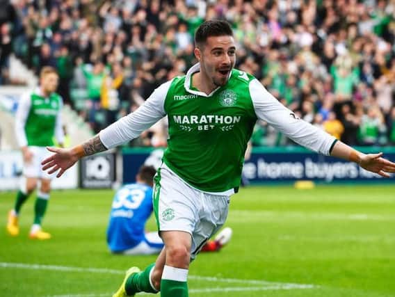 Hibs striker Jamie Maclaren wheels away in delight after putting his side three-up against Rangers only for the Ibrox side to haul themselves level by half-time in a crazy 45 minutes at Easter Road.