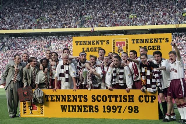 The Hearts players celebrate winning the 1998 Scottish Cup final. Pic: TSPL
