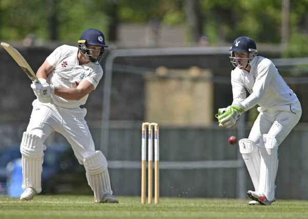 Grange wicketkeeper Patrick Ritchie, right. Pic: Neil Hanna