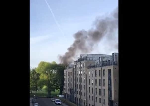 The fire has sent thick smoke billowing across the city. Picture: Twitter/@mrbuckwheel
