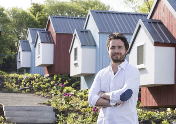 Josh Littlejohn, Social Bite co-founder, in front of the NestHouses at the Social Bite Village. Picture: PA