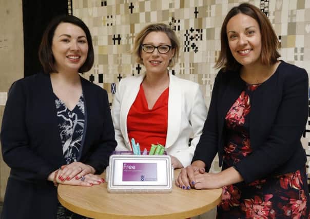 (L-R) Monica Lenon MSP (Lab), Gillian Martin MSP (SNP) and Kezia Dugdale MSP (Lab) at the launch the free sanitary products for women initiative at the Scottish Parliament in Edinburgh. Picture: Picture: Andrew Cowan/Scottish Parliament/PA Wire