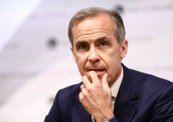 Mark Carney, the governor of the Bank of England, said an independent Scotland could share the pound but it might be politically difficult (Picture: Bloomberg via Getty)