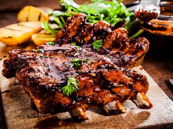 Get your hands dirty with these delicious ribs right here in Edinburgh (Photo: Shutterstock)