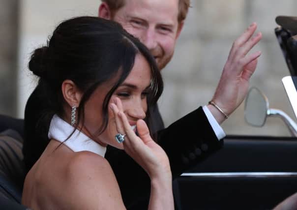 The happy couple leaving their wedding in Windsor. Picture; Getty Images