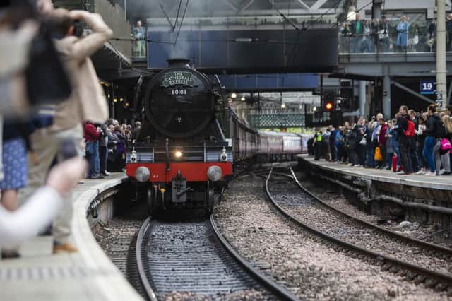 The Flying Scotsman arrives into Edinburgh Waverley before it sets off around the Fife Circular.
