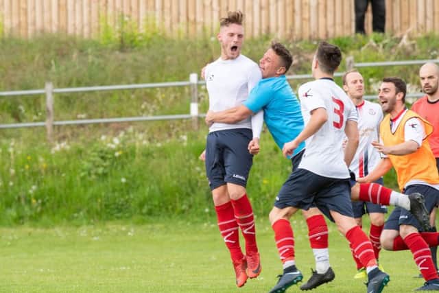 Paolo Buzzi celebrates his winner for Strollers. Picture: Ian Georgeson