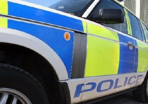 Armed police rushed to the property on Stenhouse Terrace shortly after midday