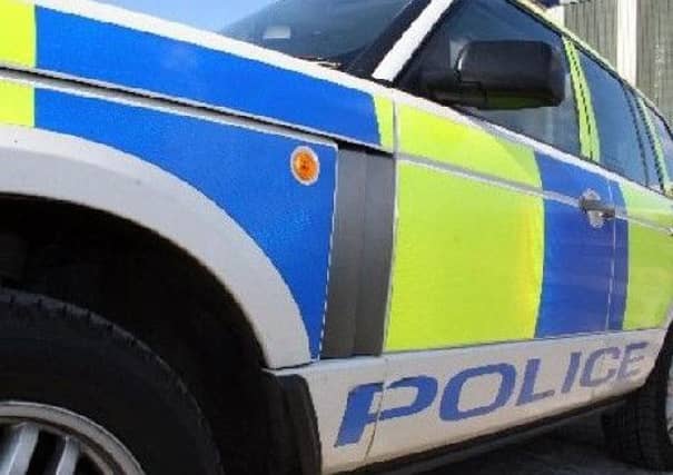 Armed police rushed to the property on Stenhouse Terrace shortly after midday