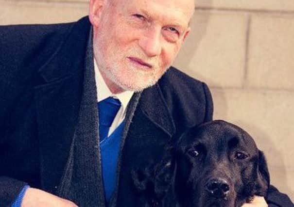 Councillor Derek Howie and his guide dog Lloyd