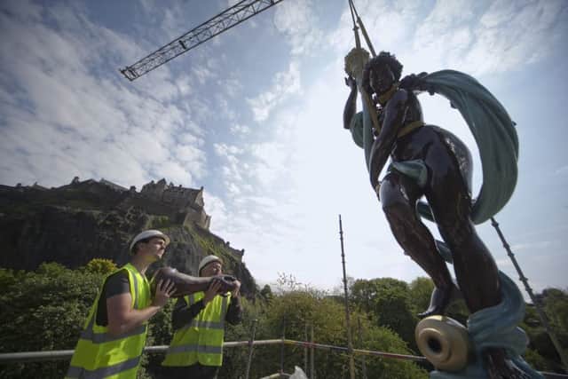The statue at the top of The Ross Fountain in West Princes Street Gardens was put back into place today marking the completion of the Â£1.9M renovation. Picture: A Linford/TSPL