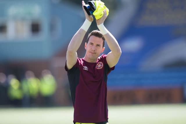 Jon McLaughlin thanks the Hearts support after the final match of the season... but could he be back? Picture: SNS Group