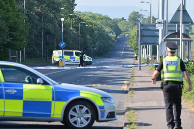 Maybury Road will remain closed for the rest of the afternoon following a fatal road collision. Picture: Dave Johnson/Edinburgh Evening News