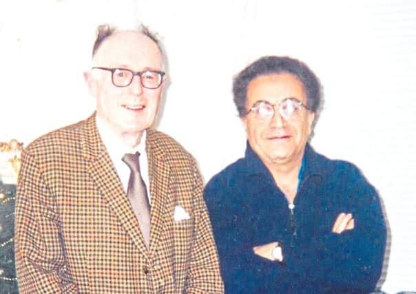 Malcolm Muirhead (left) pictured with friend Hamid Khosrowpour