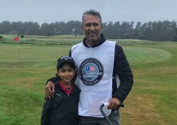 Jeev Milkha Singh with his son