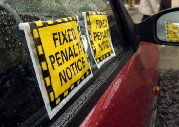 A new online system will allow motorists to contest parking and bus lane penalties. Picture: Toby Williams
