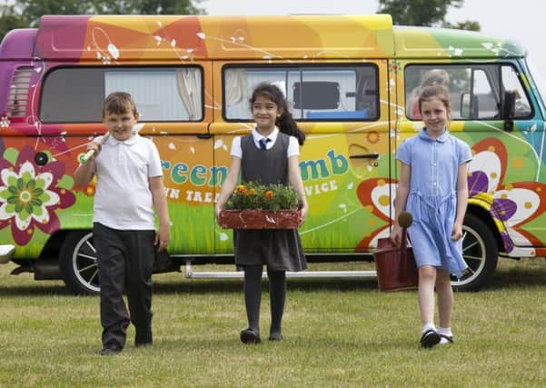 Flower show preparation at Ingliston - Lucas Craig, 8, Zaina Mohammad, 8 and Hayley Donnell.
