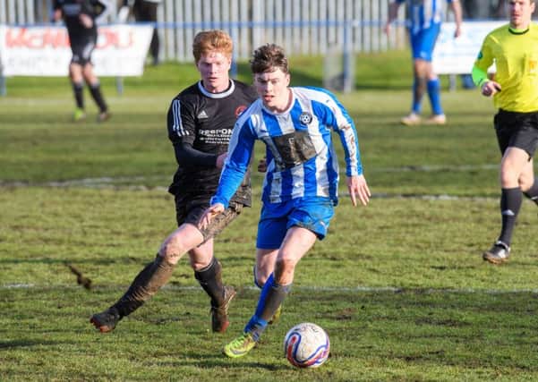 Sam Jones (right) in action for Penicuik. Pic: Ian Georgeson