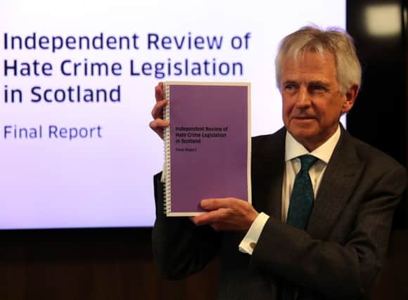 Lord Bracadale holds a copy of his report during the publication of his Independent Review of Hate Crime Legislation. Picture: Andrew Milligan/PA Wire