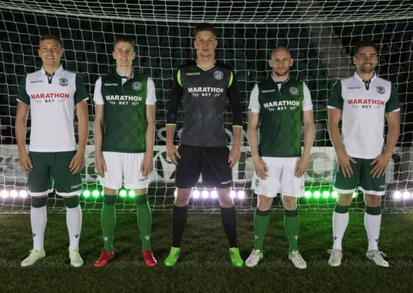 From left, Ryan Porteous, Oli Shaw, Kevin Dabrowski, David Gray and Darren McGregor model the new Hibs kits for the 2018/19 
season. Pic: Hibernian FC
