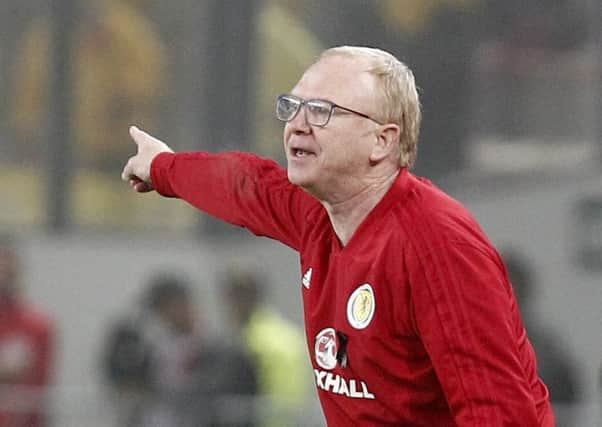 Alex McLeish issues instructions in the game against Peru