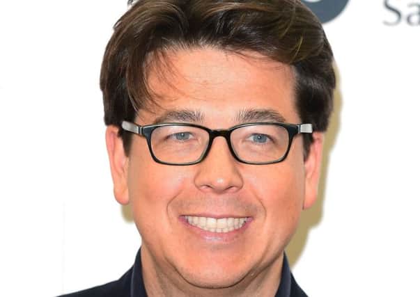 Michael McIntyre had been waiting in his vehicle to collect his sons in north London when he was attacked by two males. Picture: PA Wire