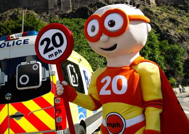 Edinburgh's 20mph mascot, The Reducer, gets the message across. Picture: Scott Louden