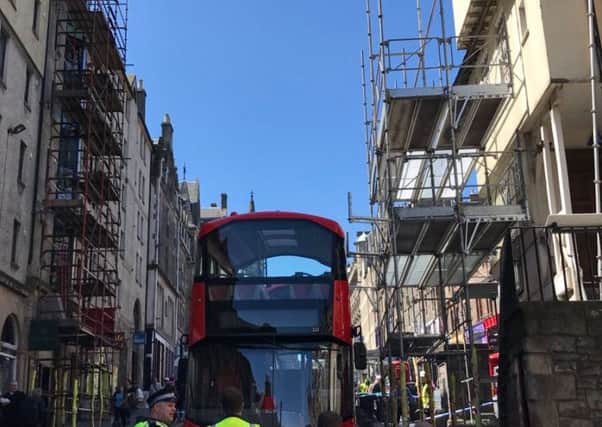 High Street has been closed after a bus appeared to hit scaffolding. Picture @Brianjaffa