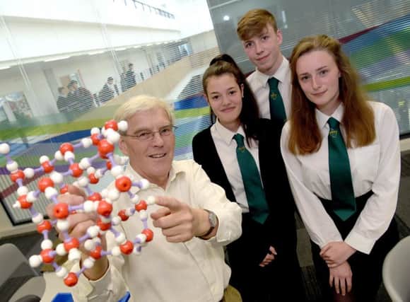 Nobel Prize winner Frank Henderson takes a science masterclass at his former school with S6 pupils Daniela Badihi, Adam Jacques, Catherine Whymark-Abbott and Dr Frank Henderson. Picture: Lisa Ferguson
