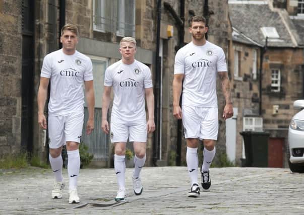 From left, Gareth Rodger, Calum Hall and Robbie McIntyre model Edinburgh Citys new kit. Pic: Al Linford