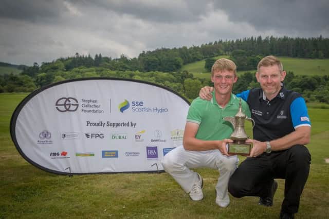 Stephen Gallacher presents the Foundation trophy to winner Connor Wilson (Castle Park GC) at Cardrona Golf Club after his win.
Pic: Kenny Smith