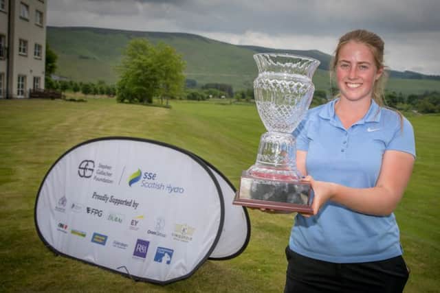 Strathmore's Kirsty Brodie shows off the Stephen Gallacher Foundation Vase after winning a play-off at Macdonald Cardrona. Picture: Kenny Smith