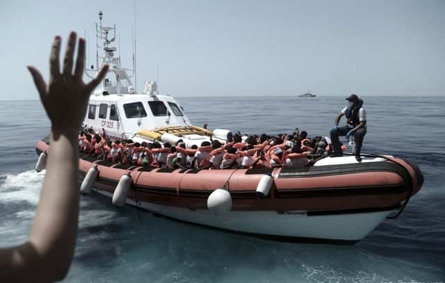 Migrants on a Italian Coast Guard ship after being transferred from the Aquarius ship, in the Mediterranean Sea. Picture: AP