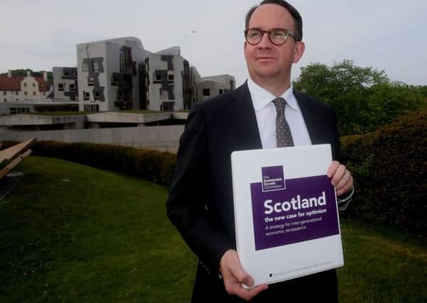 The Sustainable Growth Commission  chair Andrew Wilson outside the Scottish Parliament.Picture; PA