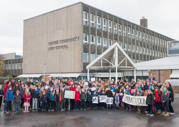 Currie Community High parents and children protest against the plans for their school. Picture: Ian Georgeson