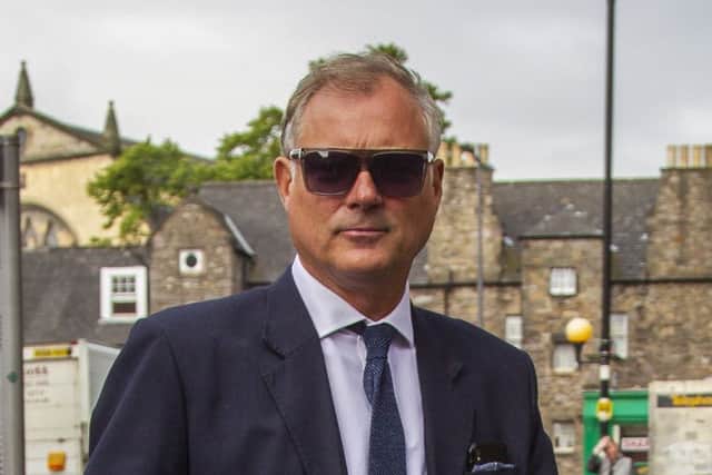 Former Blue Peter presenter John Leslie arrives at Edinburgh Sheriff Court.