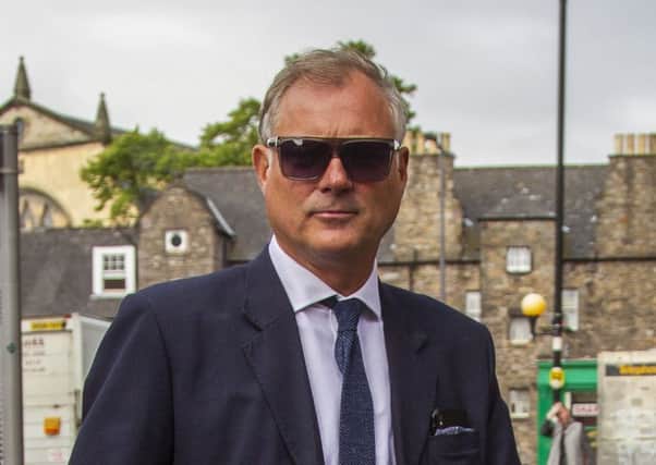 Former Blue Peter presenter John Leslie arrives at Edinburgh Sheriff Court.