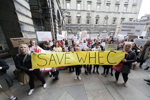 Protest outside the city chambers over proposed school closures