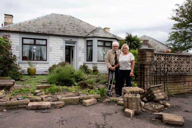 Martin and Muriel Aird got the shock of their lives when a red Audi car crashed into their garden