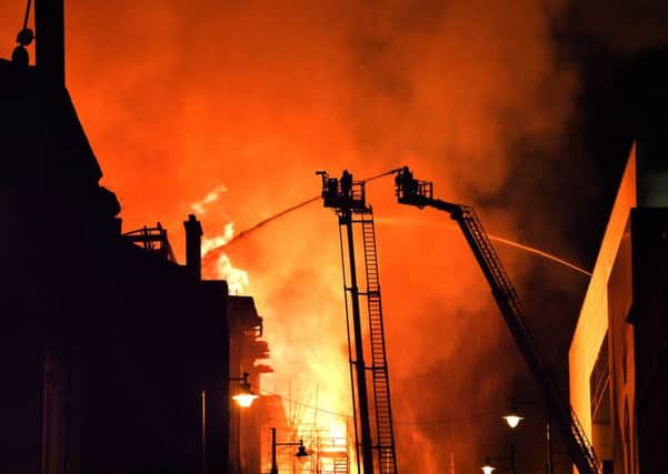 Firefighters tacke the devastating blaze that left the Glasgow School of Art building gutted. Picture: John Devlin