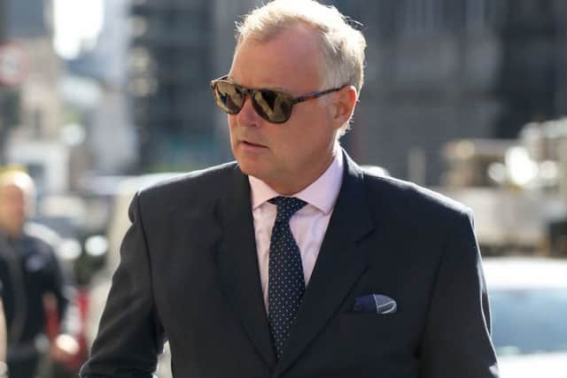 Former TV presenter John Leslie arrives at Edinburgh Sheriff Court, where he is charged with sexually assaulting a woman by putting his hand down her trousers as they danced at her hen night. Picture; PA