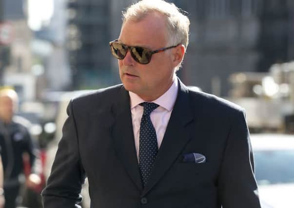 Former TV presenter John Leslie arrives at Edinburgh Sheriff Court, where he is charged with sexually assaulting a woman by putting his hand down her trousers as they danced at her hen night. Picture; PA