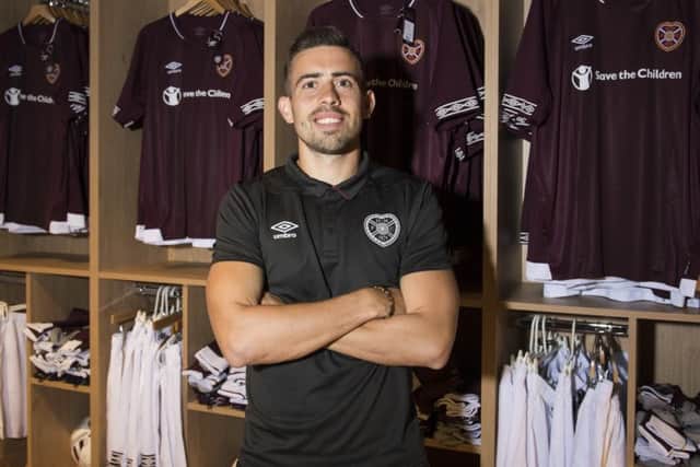 Midfielder Olly Lee at the opening of Hearts new clubstore. Pic: SNS