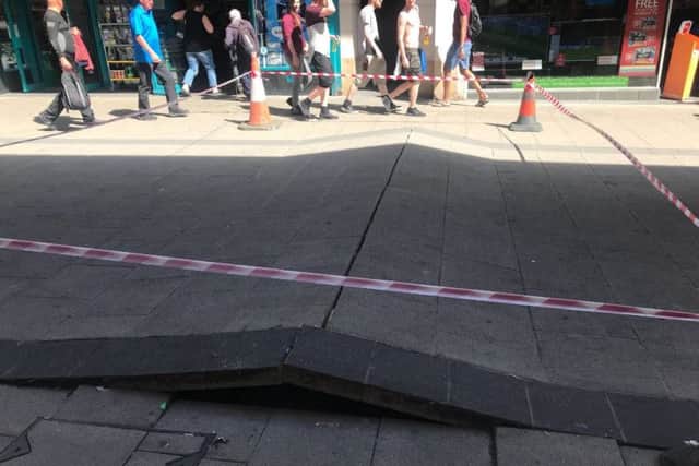 The pavement at the Newkirkgate shopping centre has buckled due to the heat. Picture: @GJMunro26