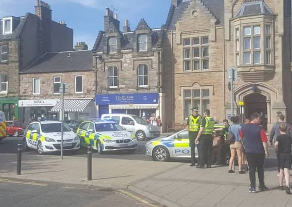 Police on the scene on Portobello High Street