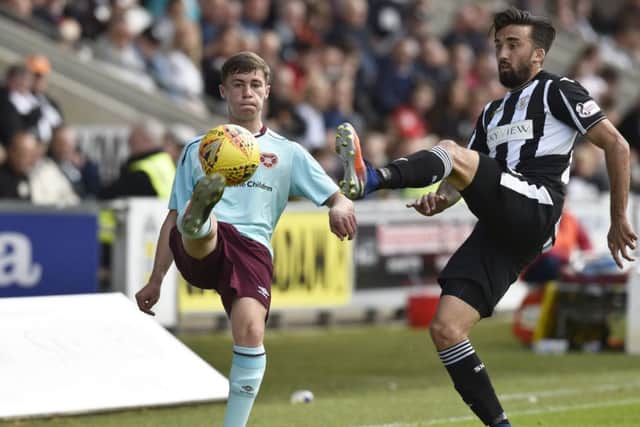 Hearts Colts' Jay Sandison (left) and Stelios Demetriou of St Mirren - who could line up against the wee Jambos for Ross County. Picture: SNS Group